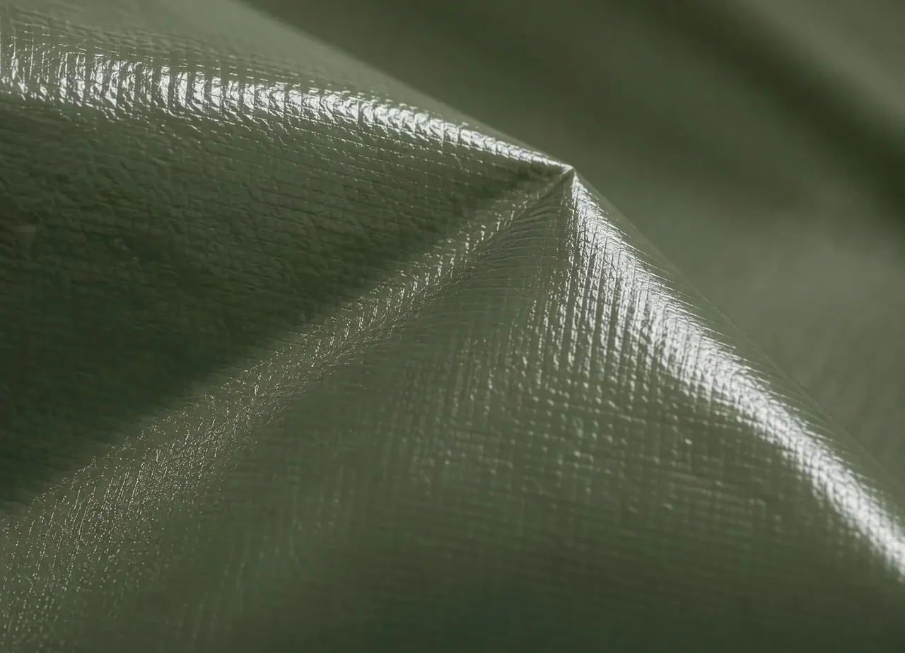 Close view of the textured green liner film